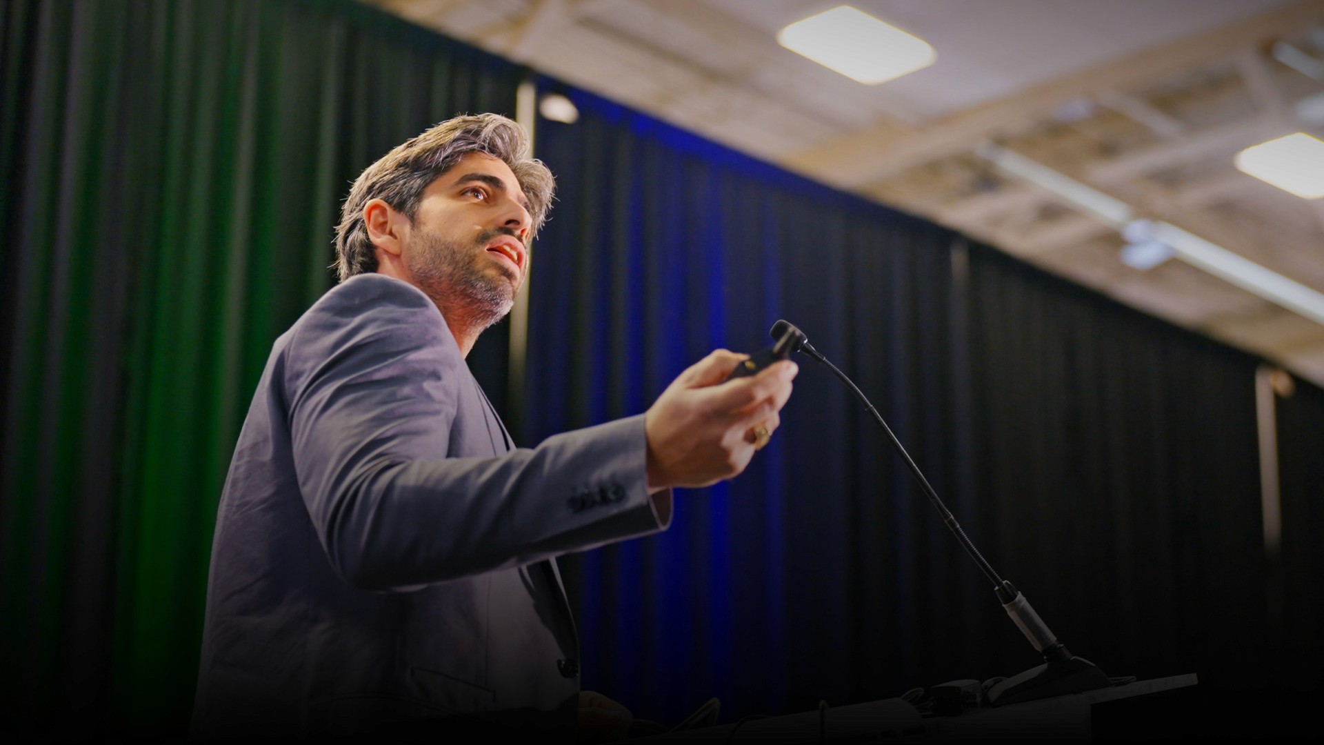 Artistic portrait with red and blue lighting creating a dramatic effect