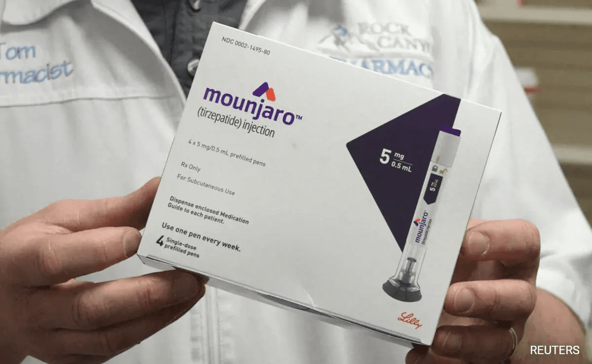 person presenting medicine - Does Mounjaro Show Up in Blood Work