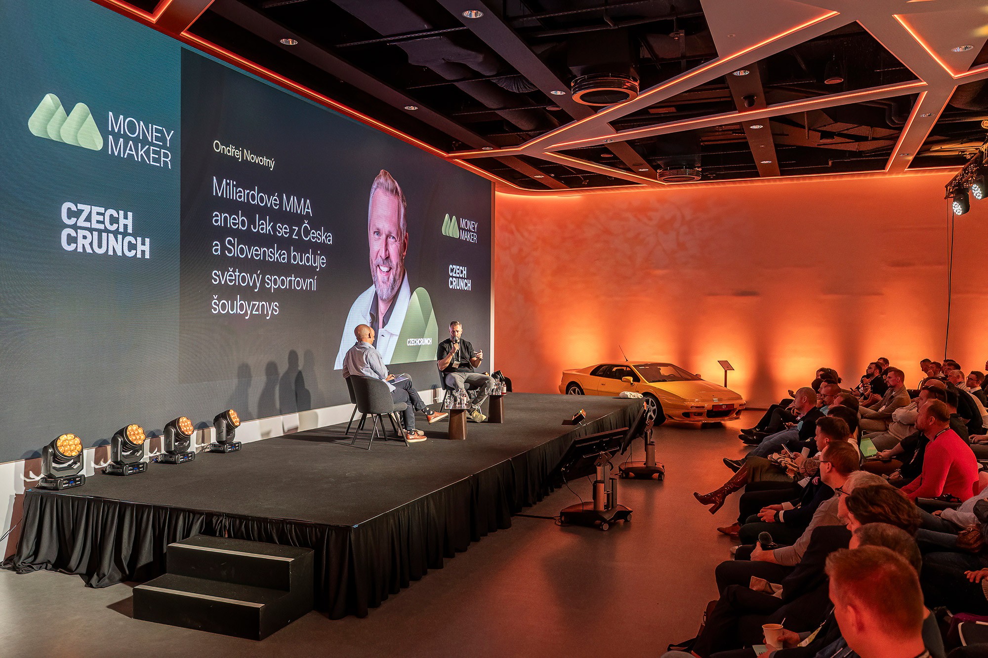 Money Maker business and finance conference in Prague with keynote speakers on stage and audience attending a large-scale event at Cubex Centre