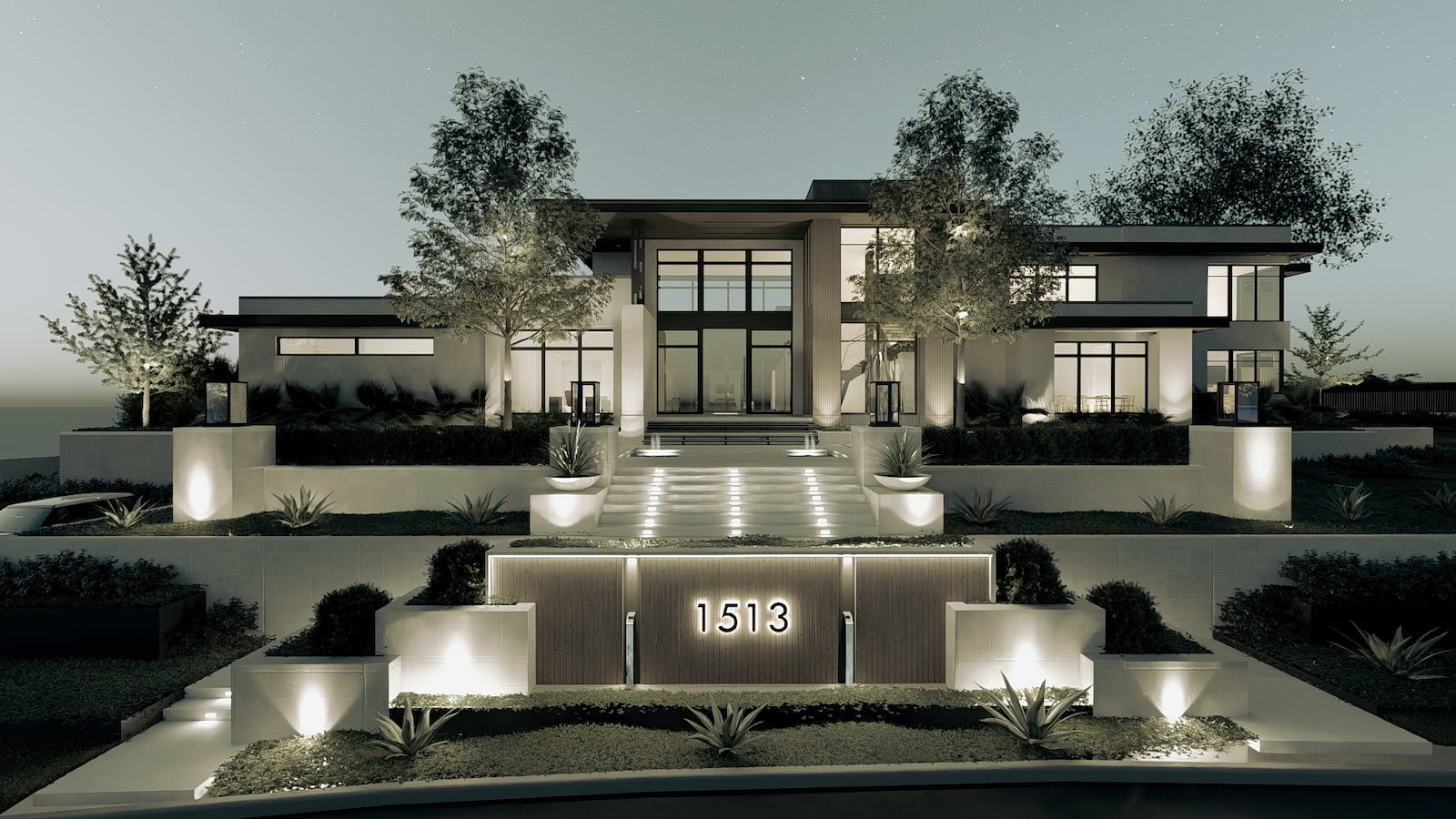 Landscape Design in Westlake featuring grand entry statement night time lighting. 