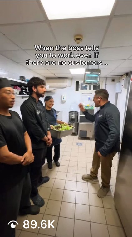 outtake from viral Instagram reel. fine dining chef giving his staff a speech in the kitchen.