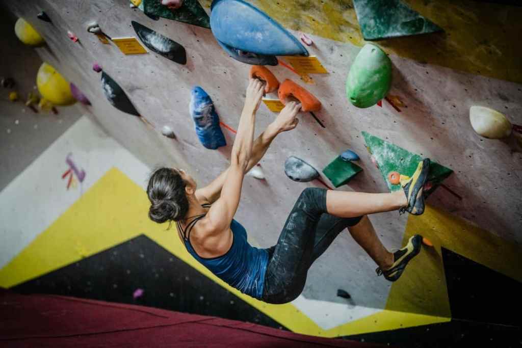 Climber on bouldering wall