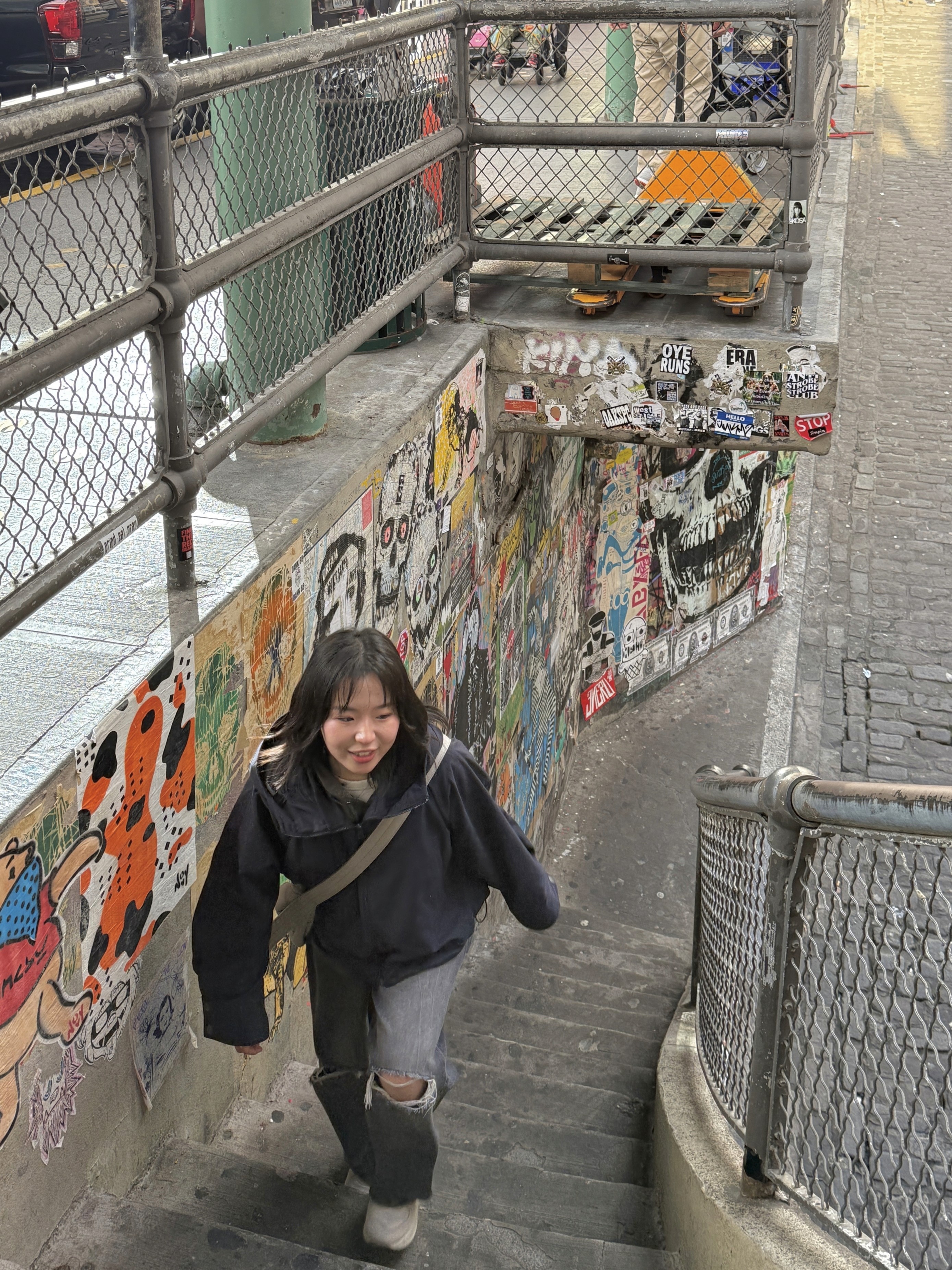 a person standing in front of a building