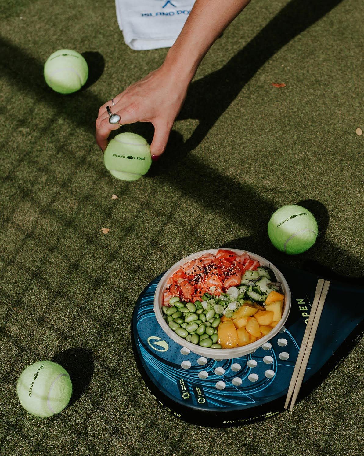 poke bowl on tennis court