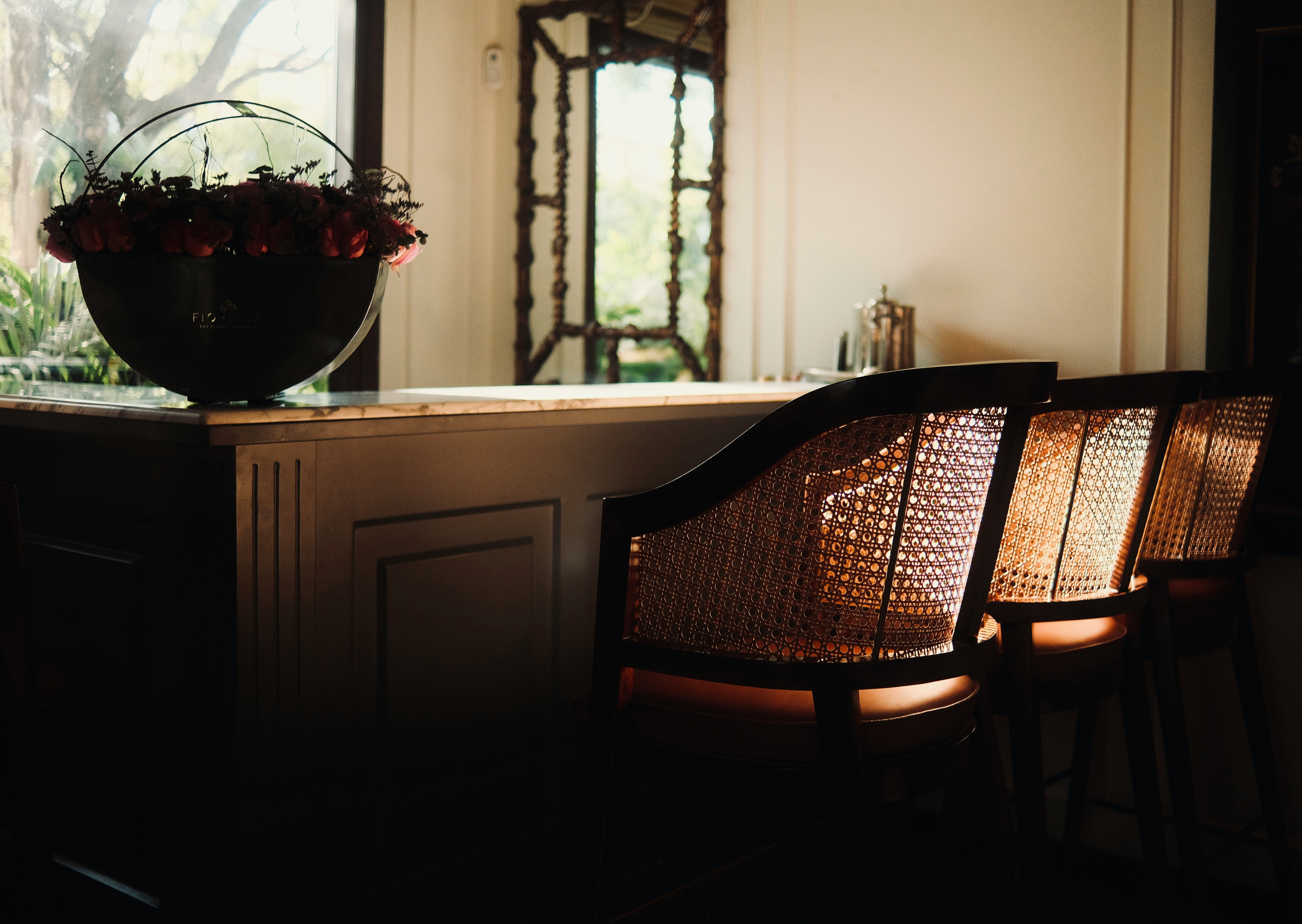 A traditional-style dining table with matching chairs.