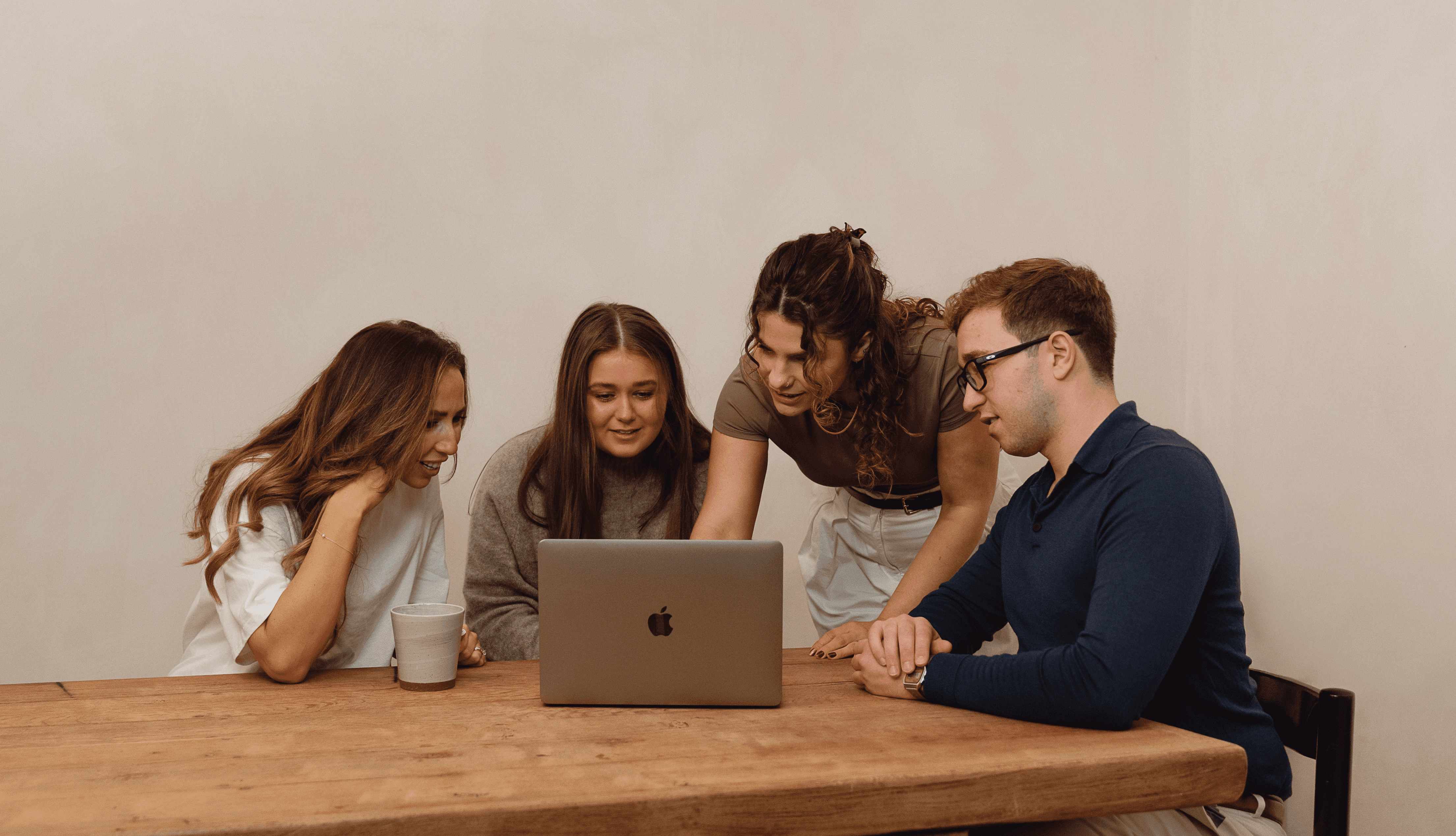 A group of colleagues laughing together