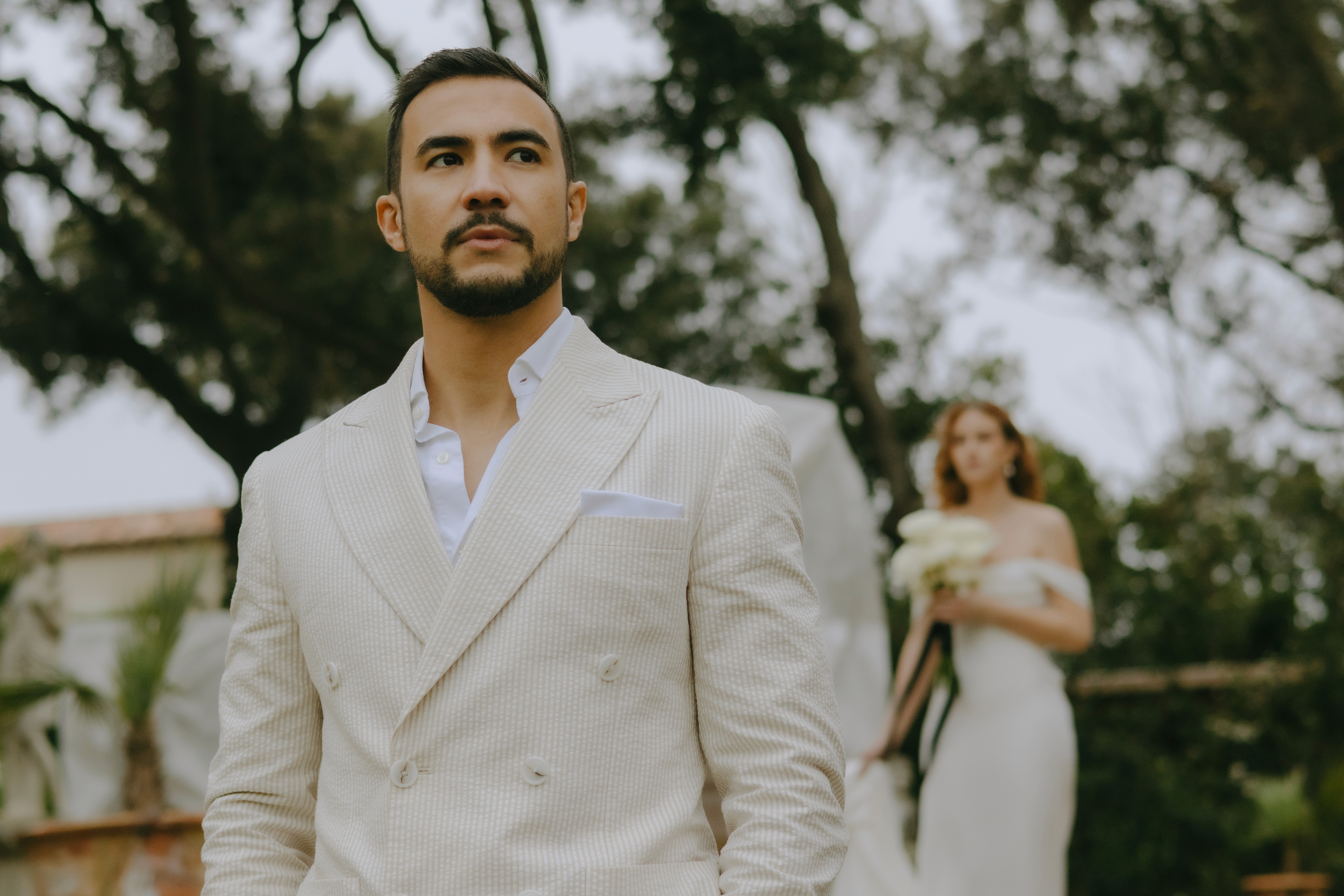 Elegant couple on cliff