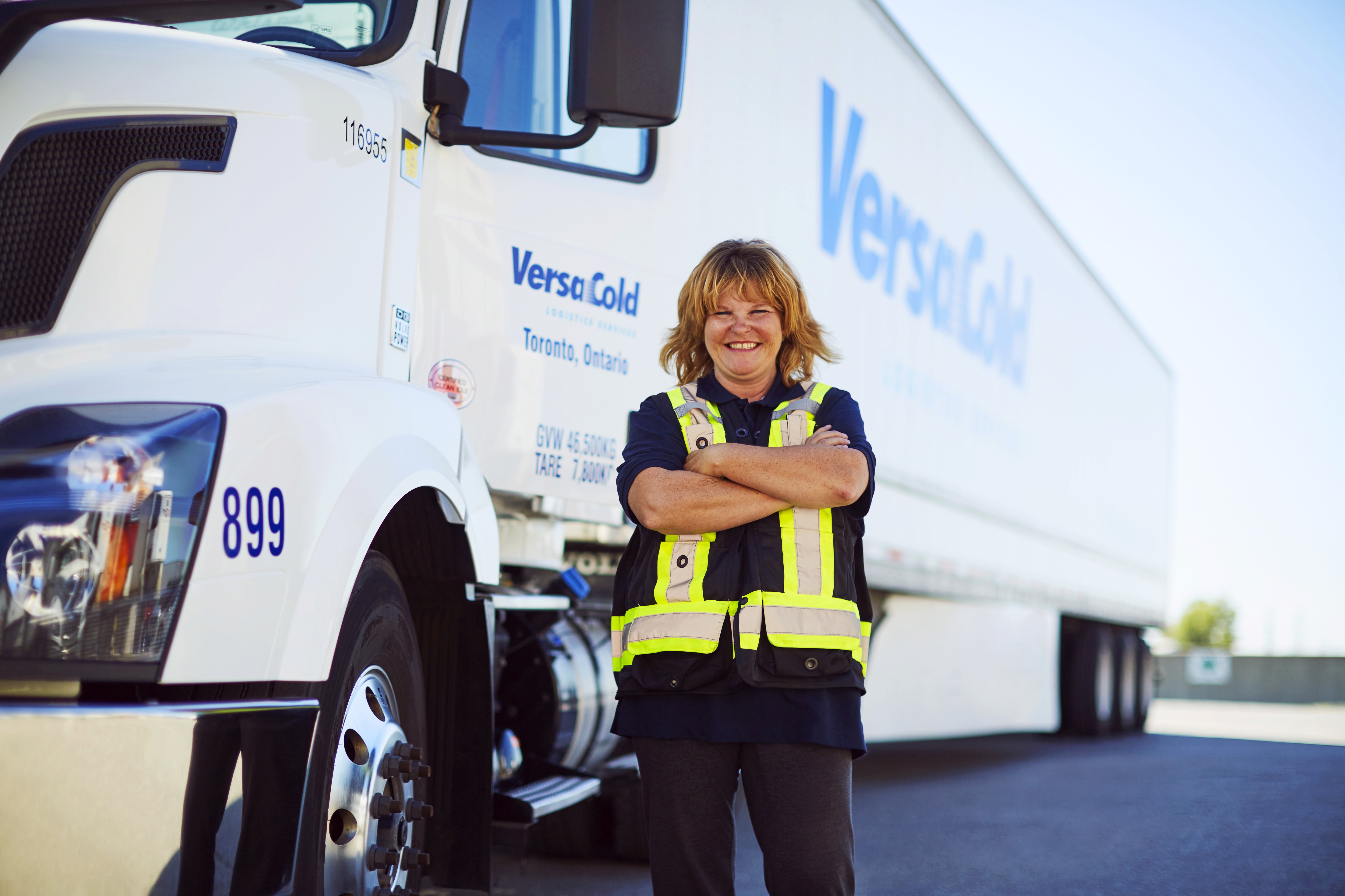 versacold employee standing by truck