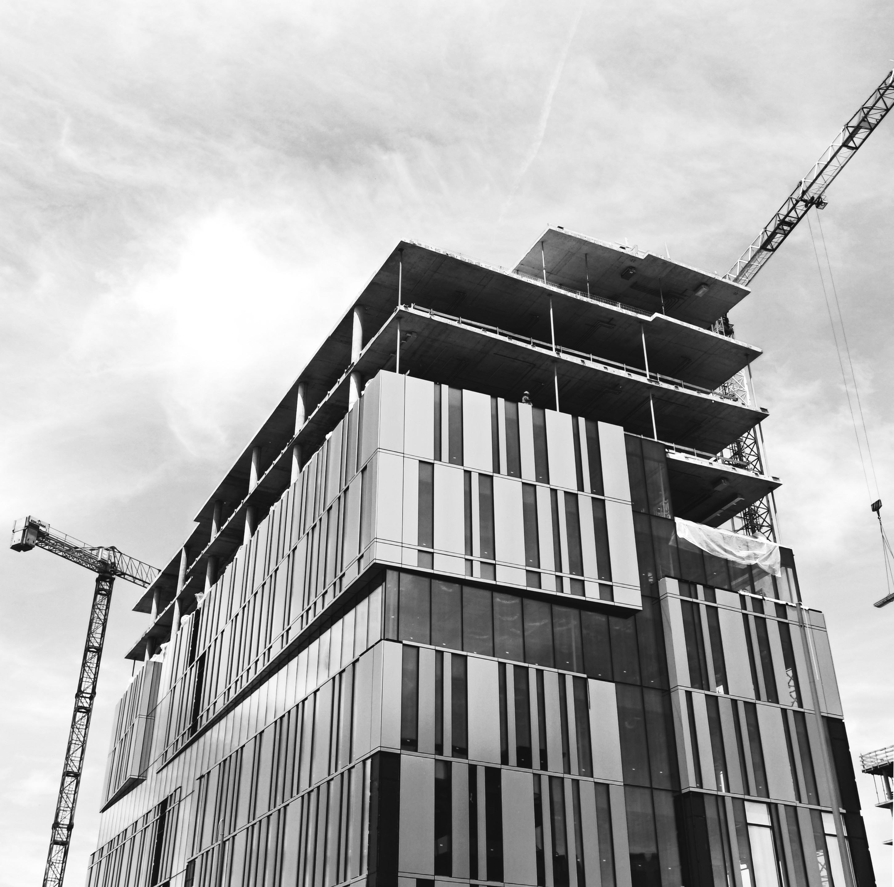 a man in a yellow shirt is on a red track