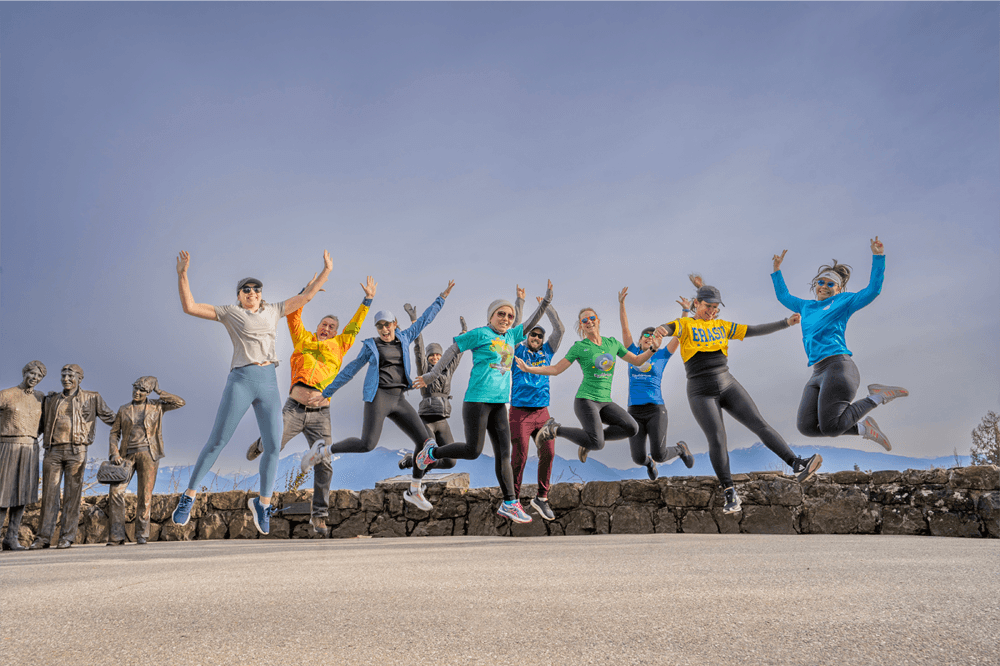 Group photo of all participants jumping together