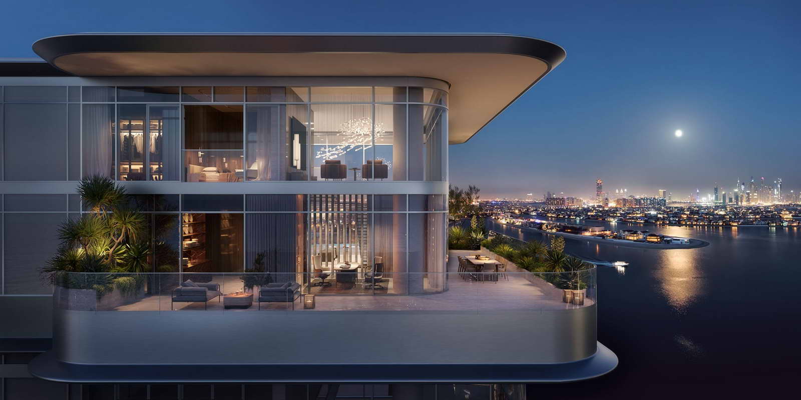 A modern apartment building named Orla Infinity, surrounded by palm trees and featuring a decorative fountain.