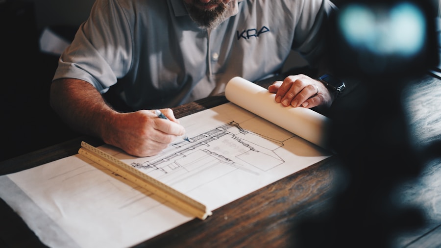 Architect reviewing development plans for a real estate project.