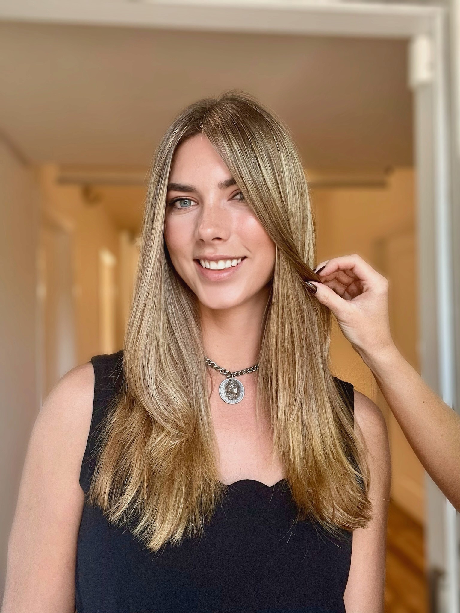 Honey blonde for brunette hair at Bomane Salon – keratin extensions with bright blonde highlights by Jenn Montoya Palmore.