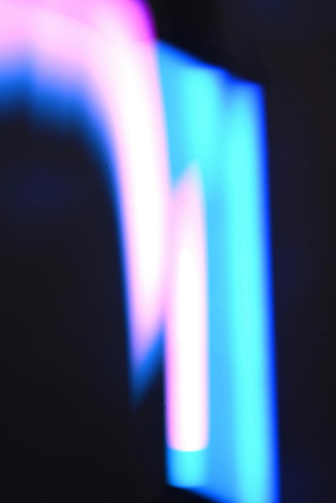 Abstract streaks of pink and blue light