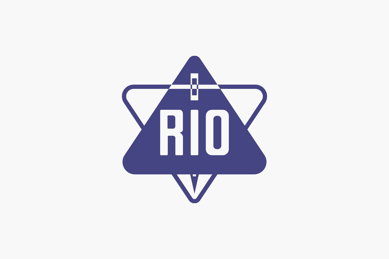 RIO Logo. Dark blue star shape with a triangle filled in and large captial letters in the centre