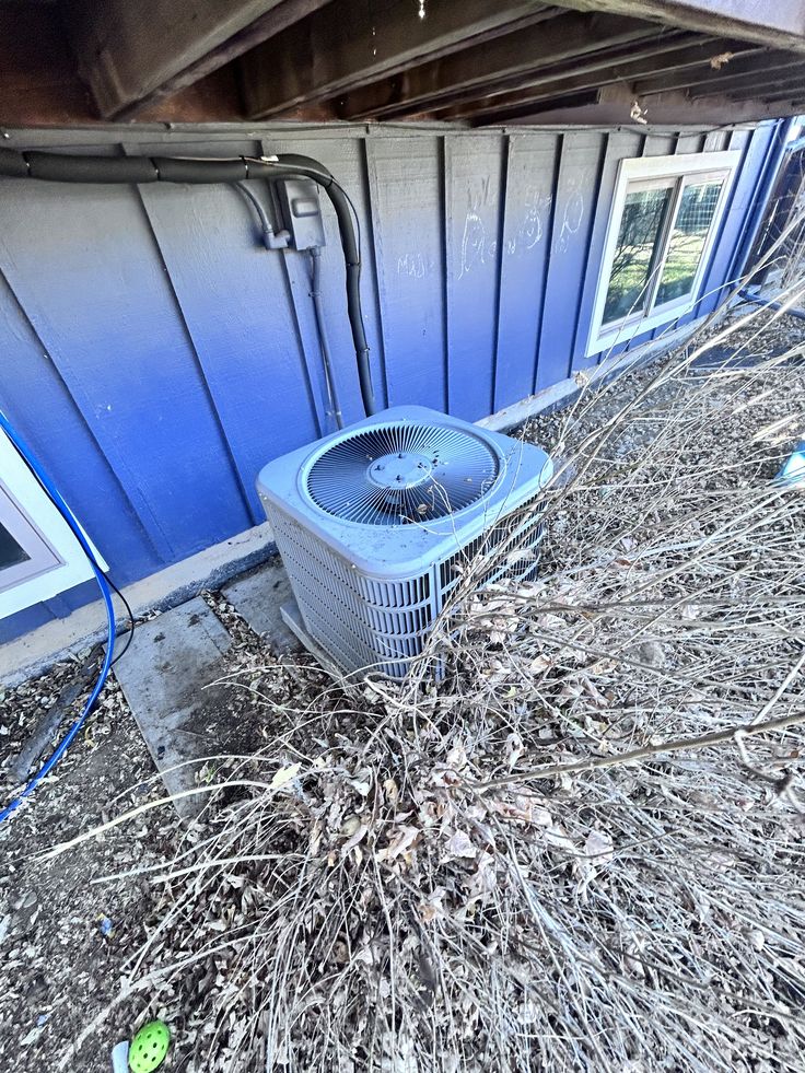 Brian and Hunter with MoJo Home Service truck in the background
