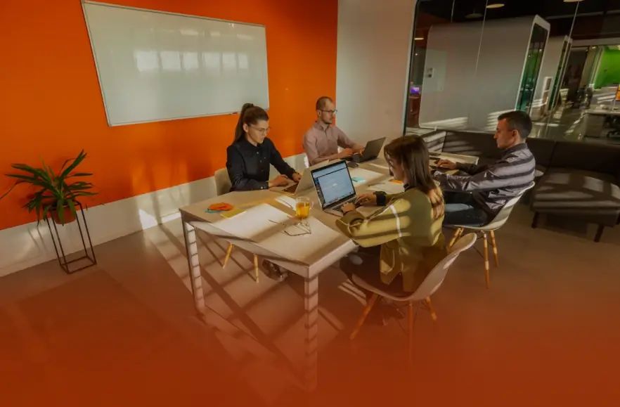 Business meeting discussing AI innovation and growth strategies