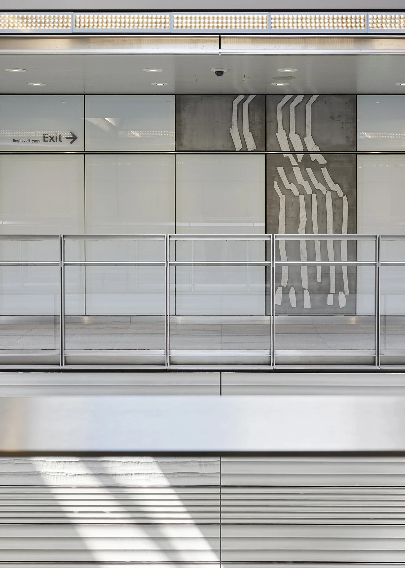 Installation photograph of the public commission work installed at Enghave Brygge Metro, Copenhagen. Concrete relief with marble motif cast in.