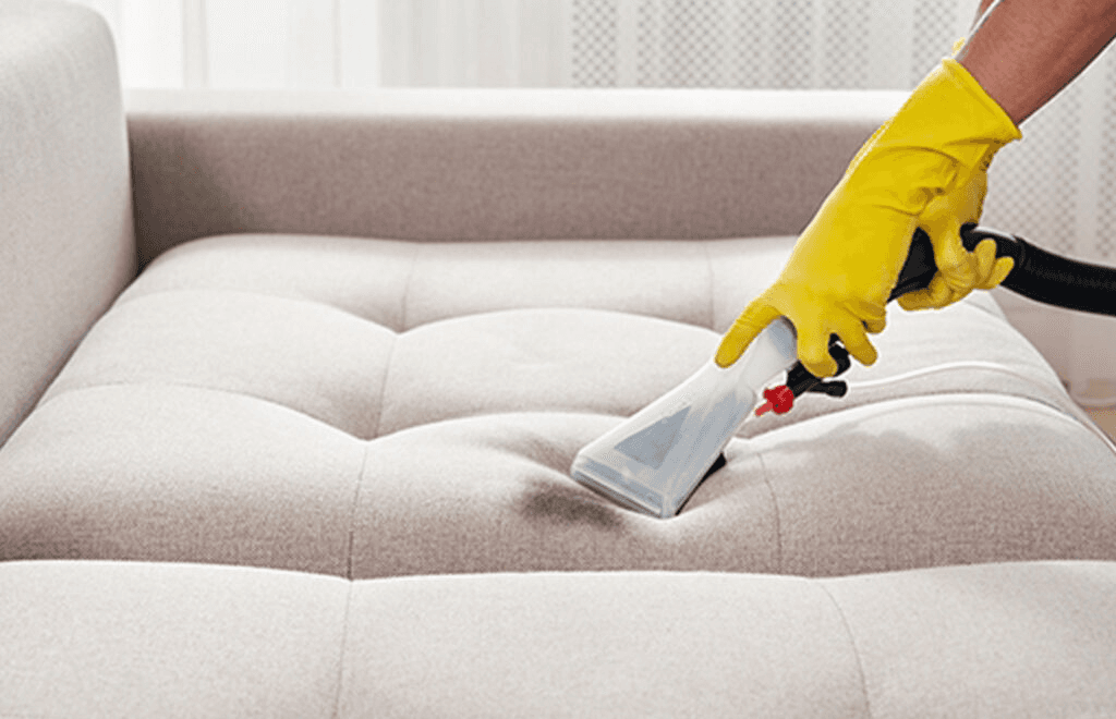 a living room filled with furniture and a large window
