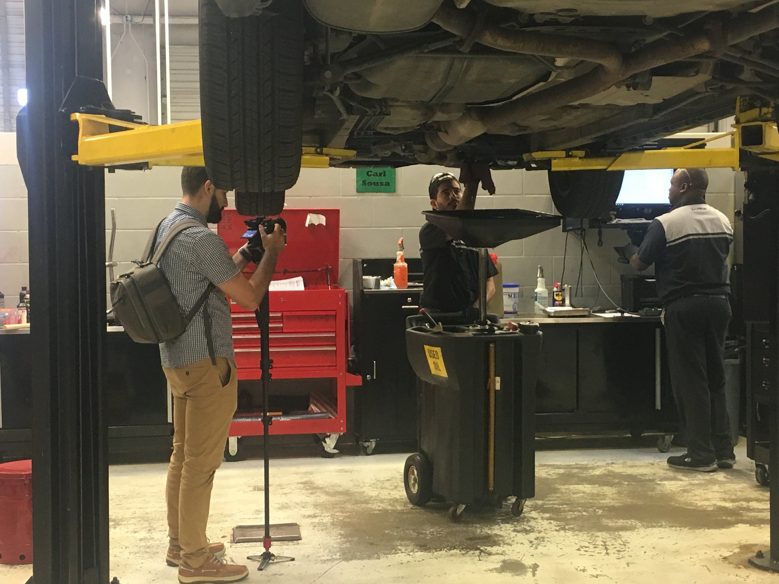  Behind the scenes! At brand28, we love capturing the culture of an organization. Shown is our video ninja getting down and dirty with the Group 1 Automotive mechanic crew. 