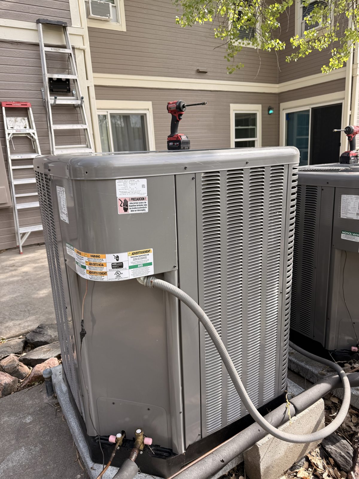MoJo technician servicing a home system