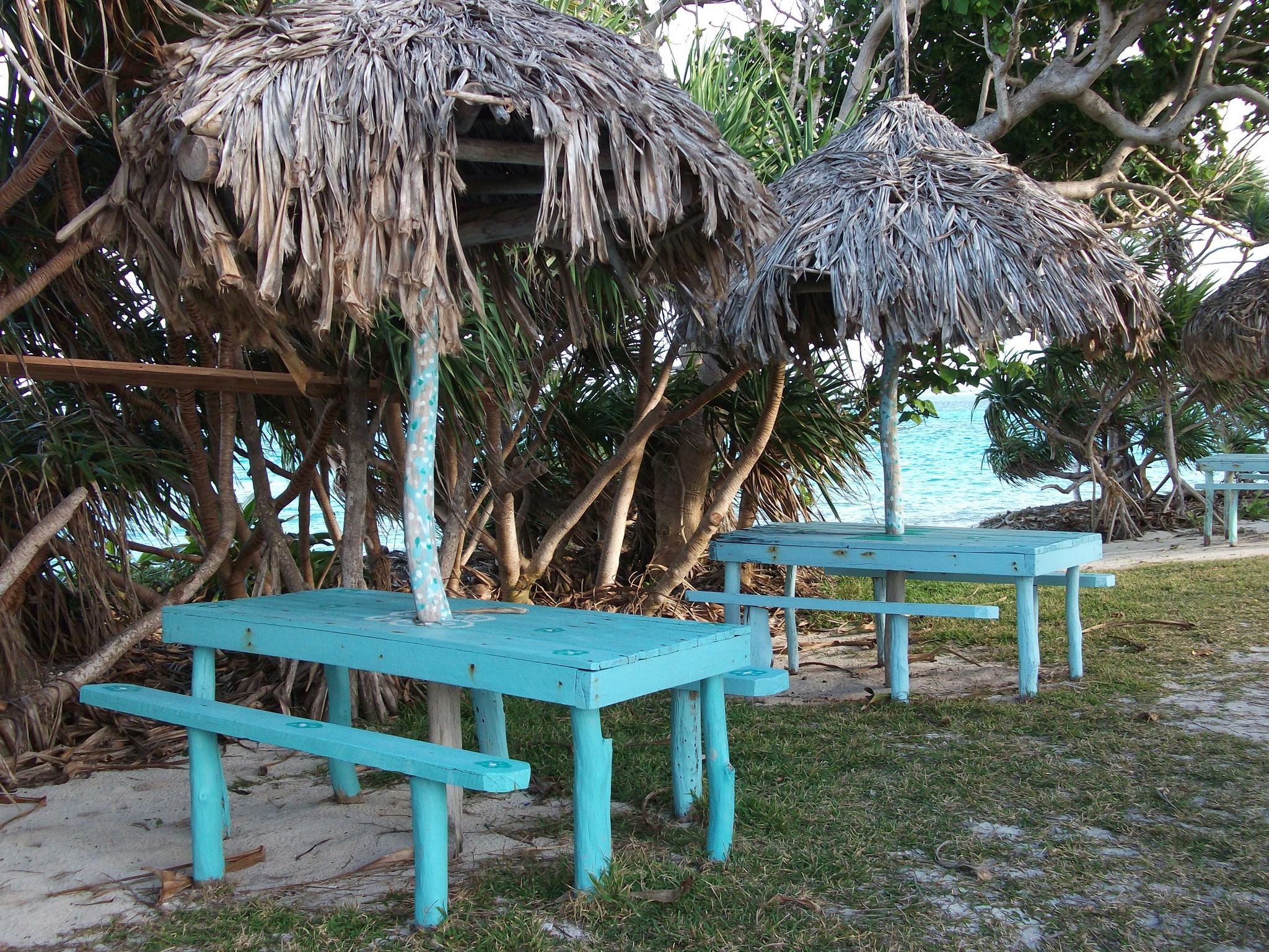 outdoor seating colorful tables beachy setting