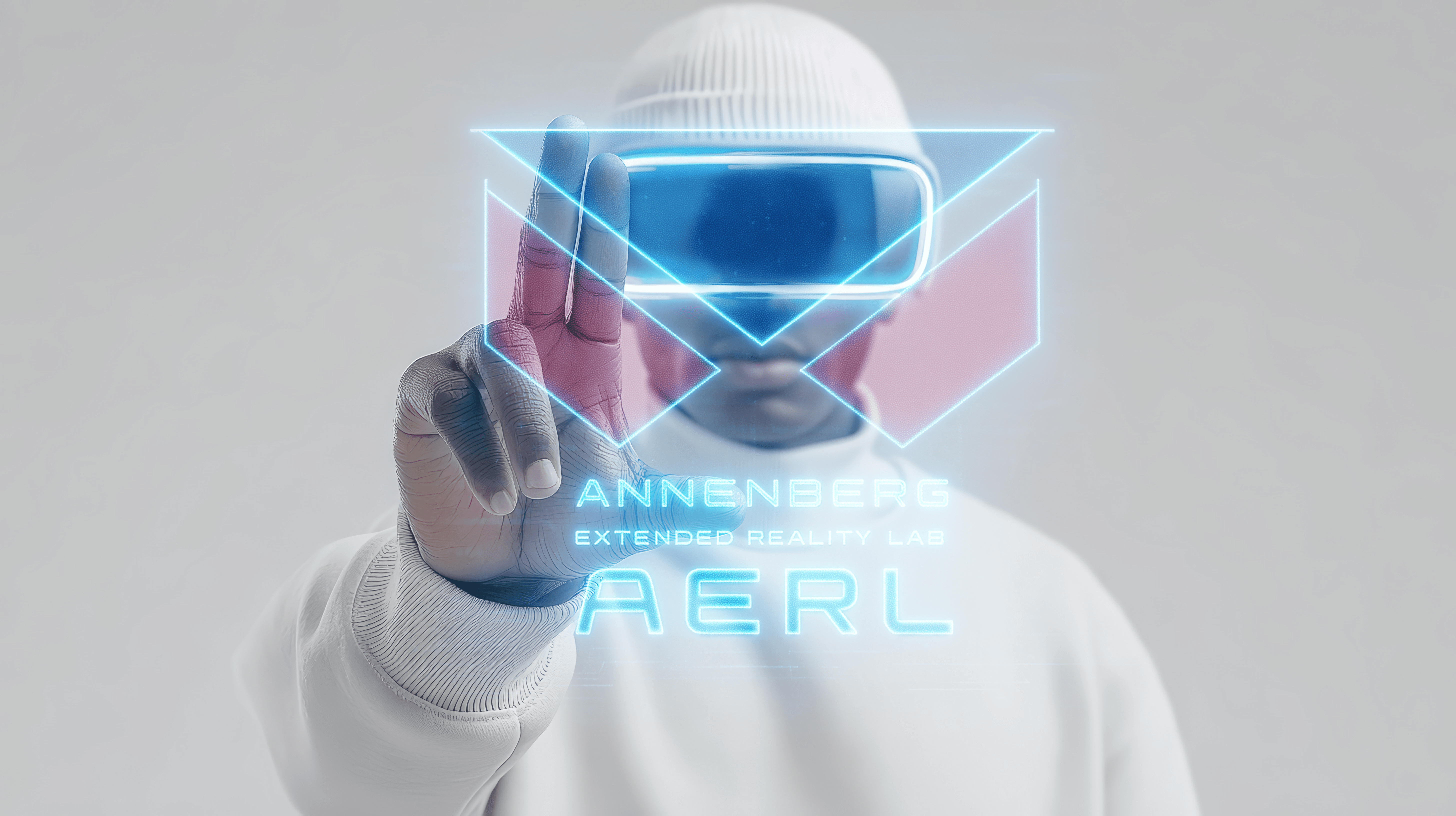 UPenn Student Interacting with Annenberg XR Lab Logo
