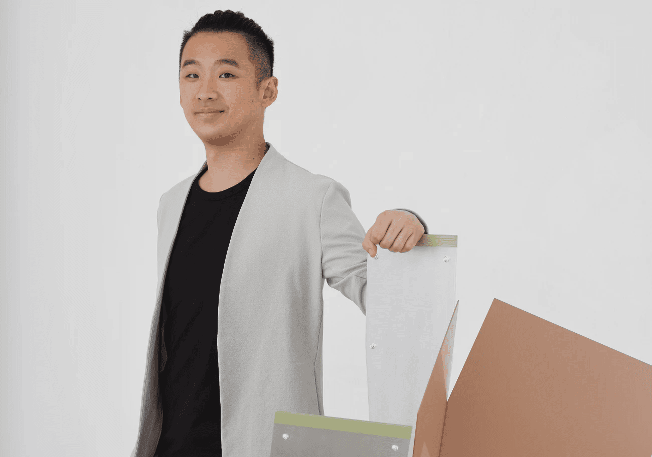 a man holding a cocktail