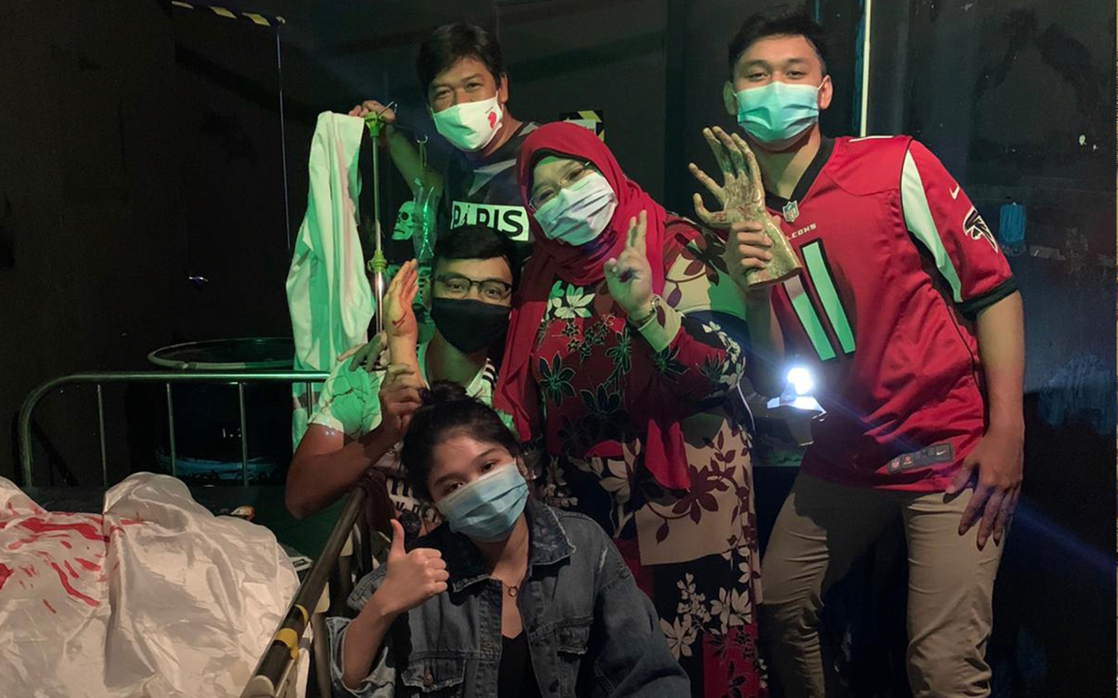 Group enjoying Trapped Escape Room experience in Singapore.