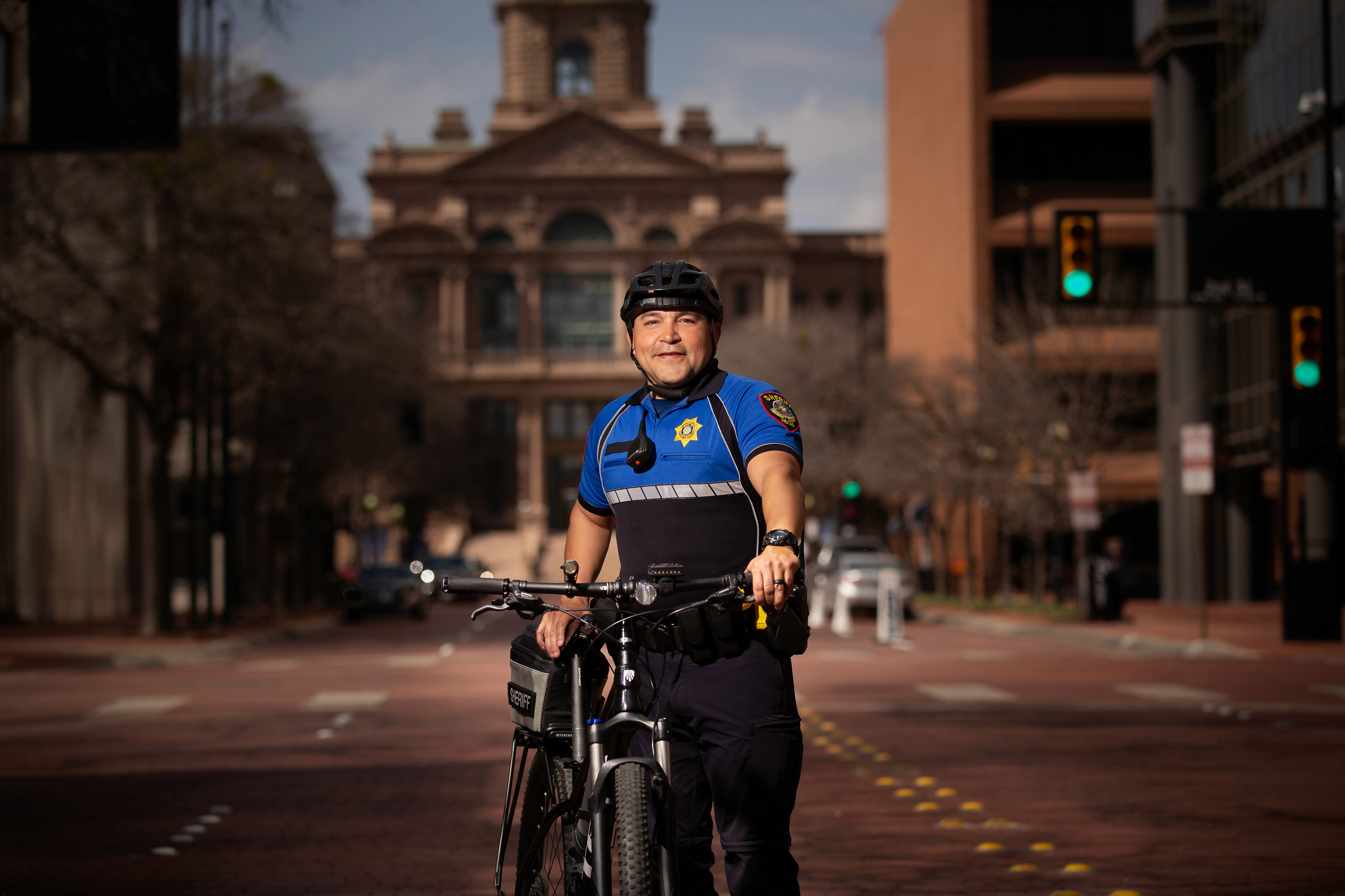 Officer with bike downtown