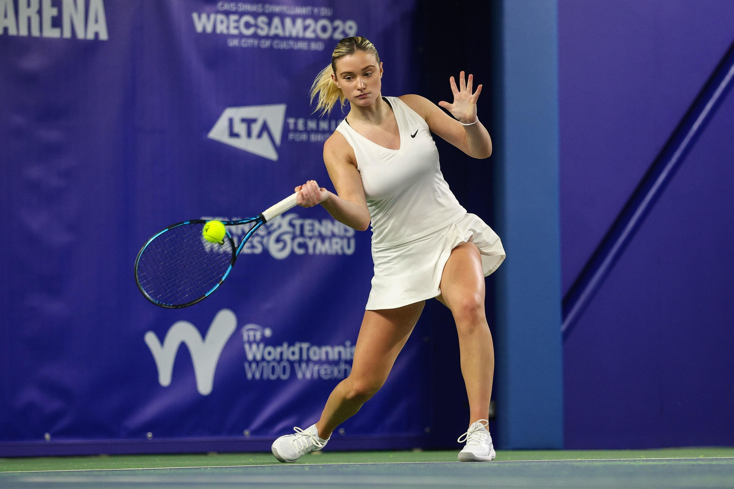 Megan Davies playing tennis