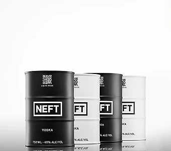 Four lined up NEFT Vodka barrels, alternating from black to white.