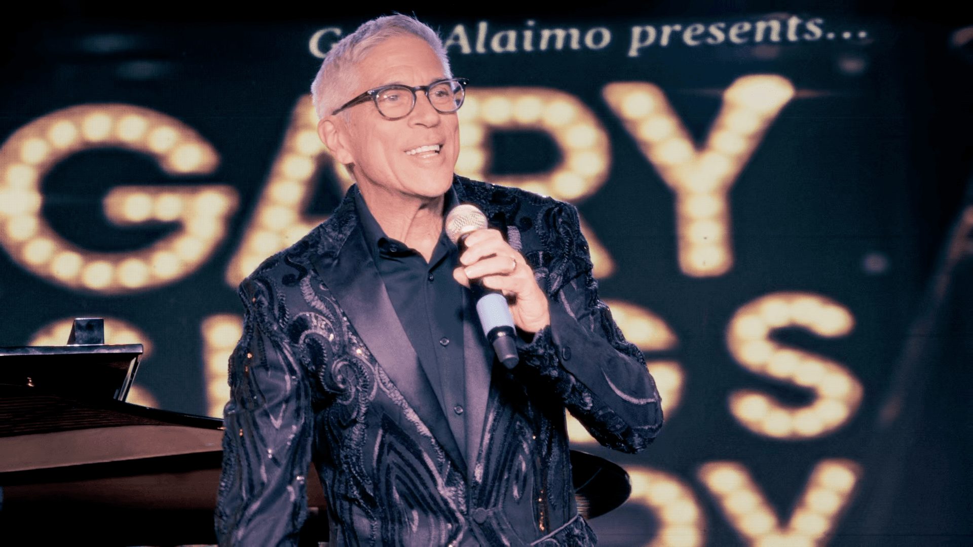 Gary Alaimo performing on stage