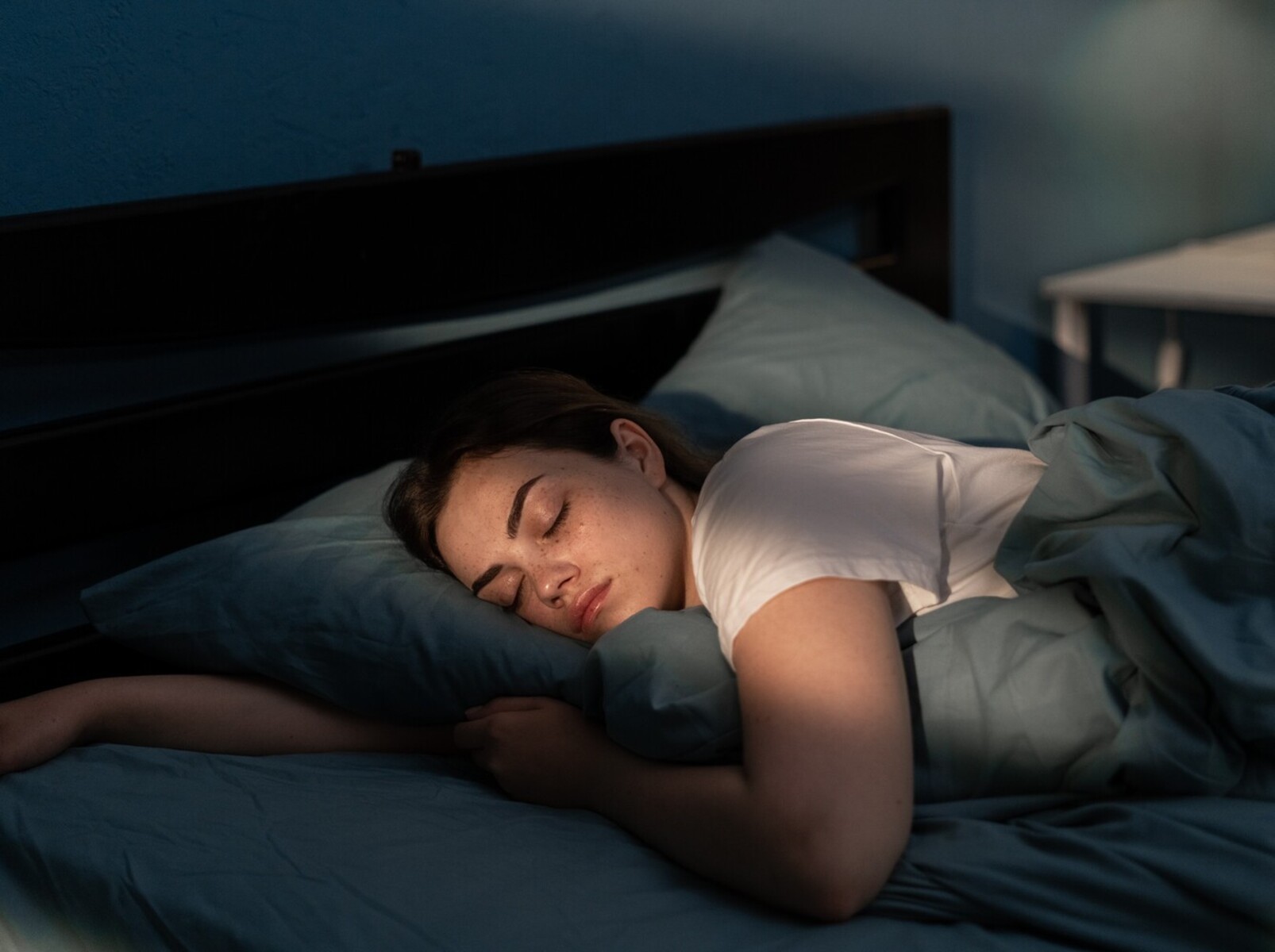 woman getting good sleep to support her swimming workouts for weight loss
