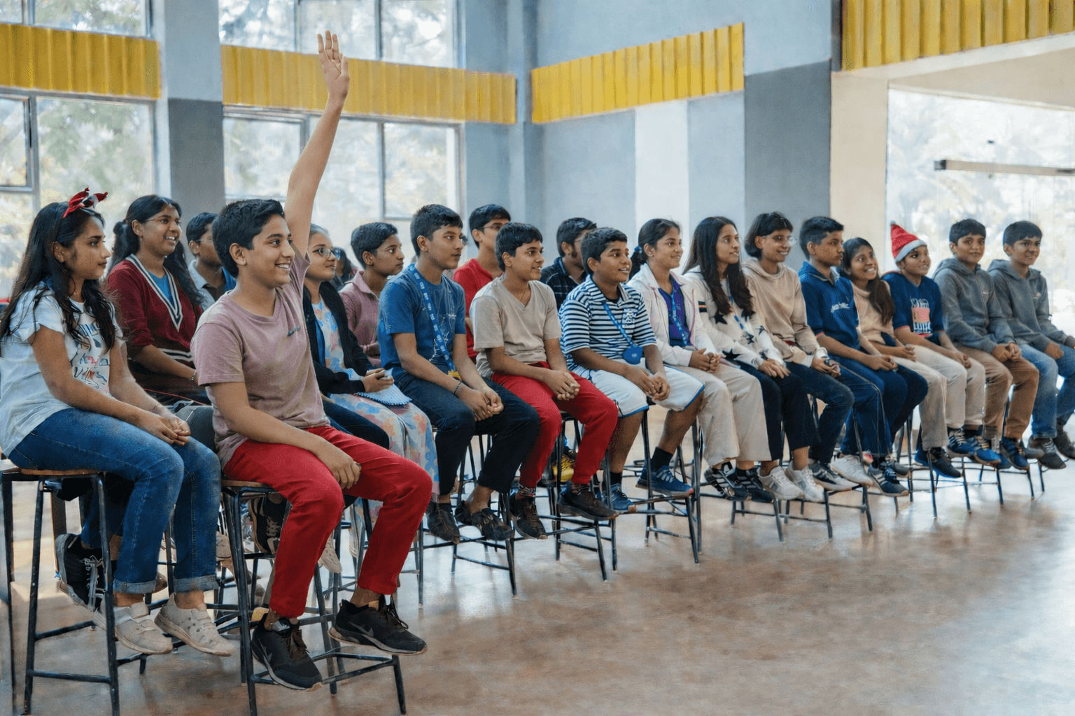 Students learning through hands-on activities in the IB School classroom environment