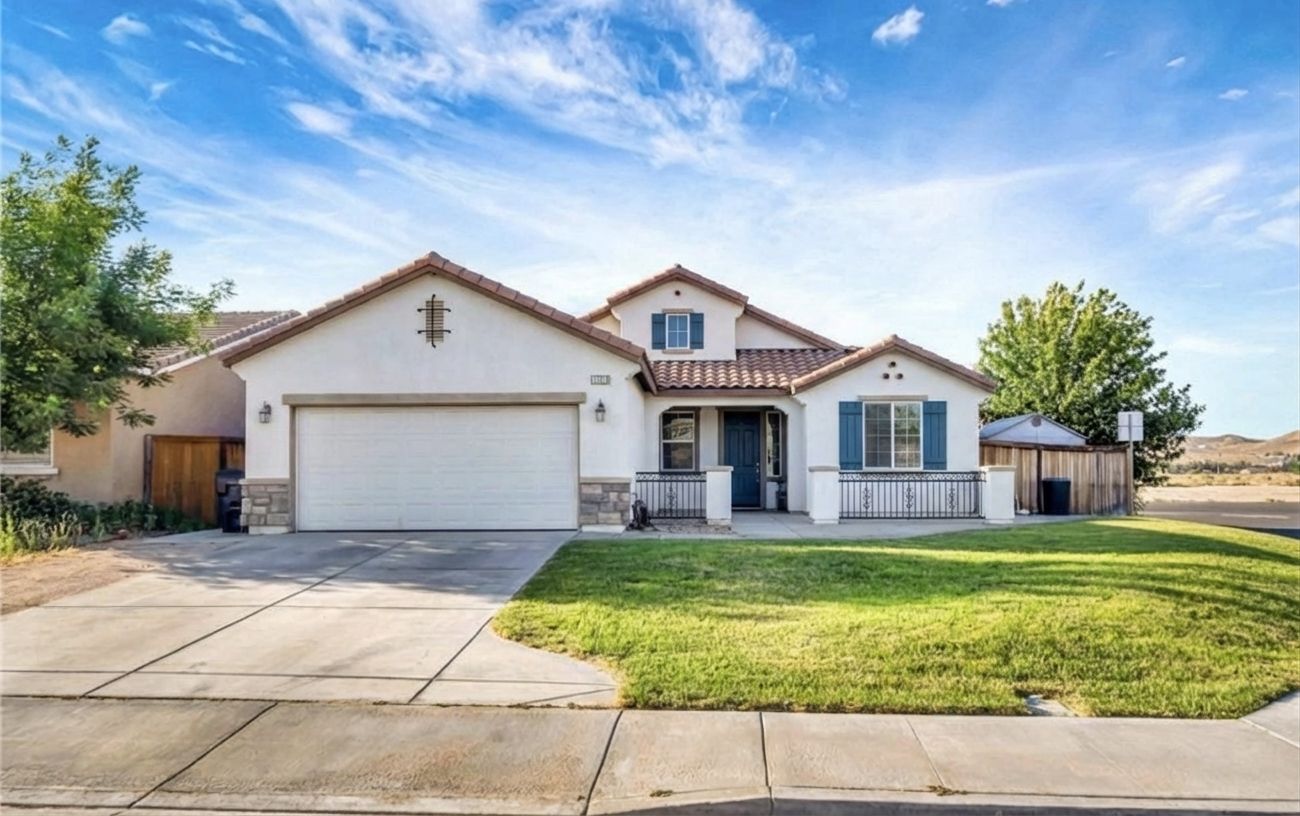 Mediterranean style exterior with white stucco and blue shutters by AI