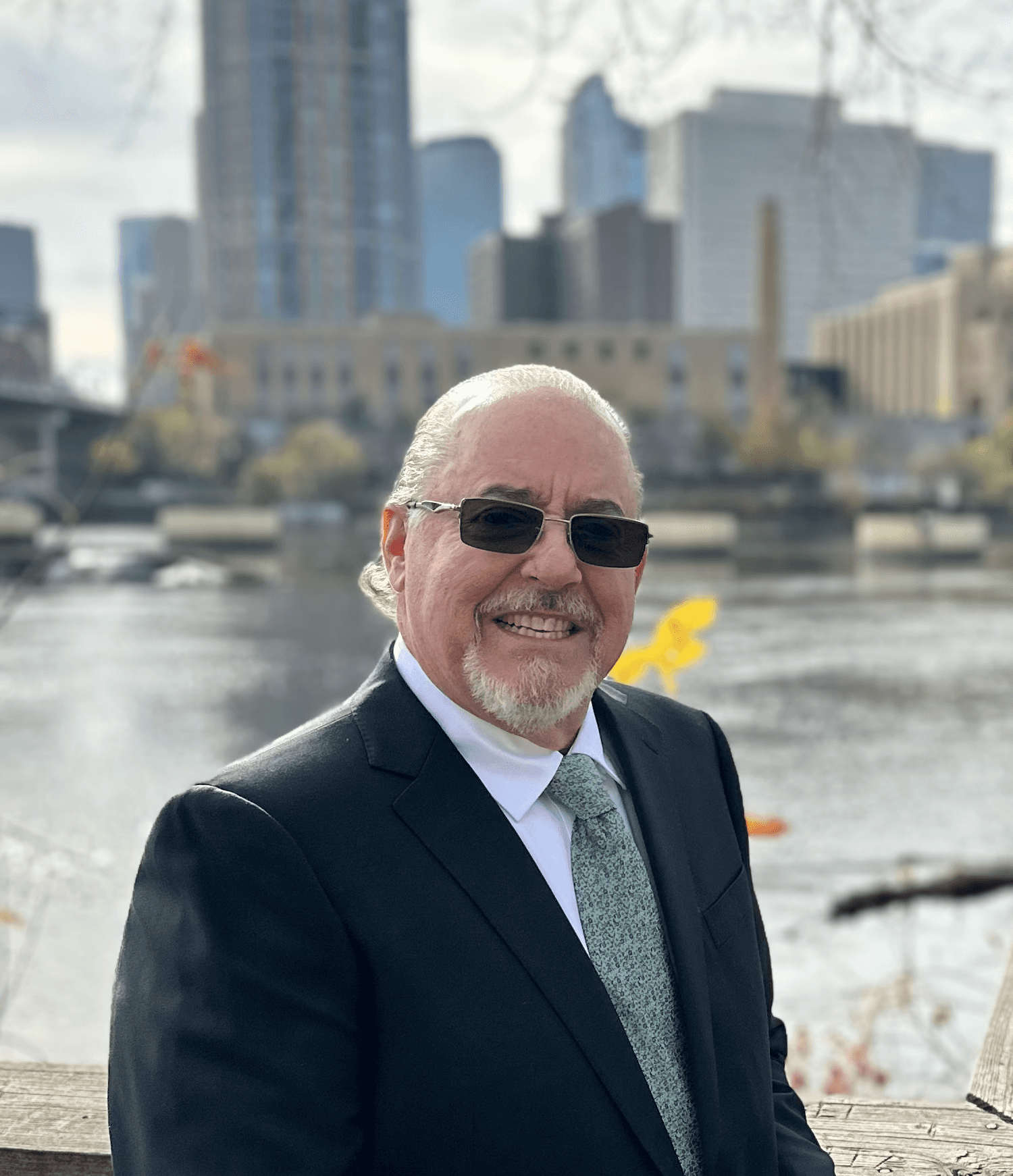 Female with glasses looking at the camera