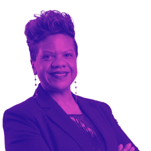 Profile portrait of a man in a white shirt against a light background