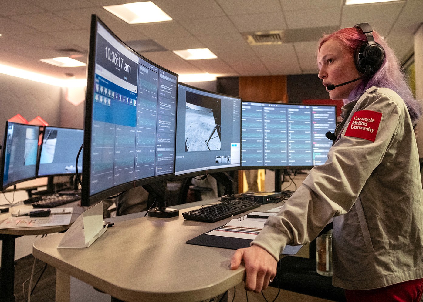 Carnegie mellon student in front of monitor using VCOM WebRTC Control Panel