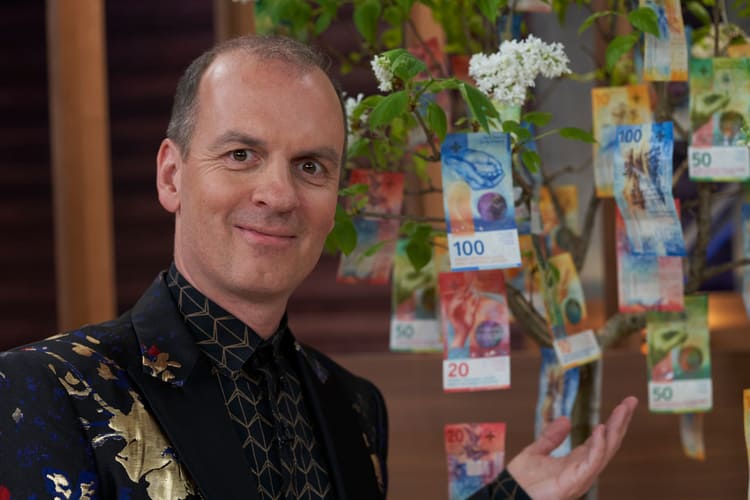Roland Brack mit Geldbaum
