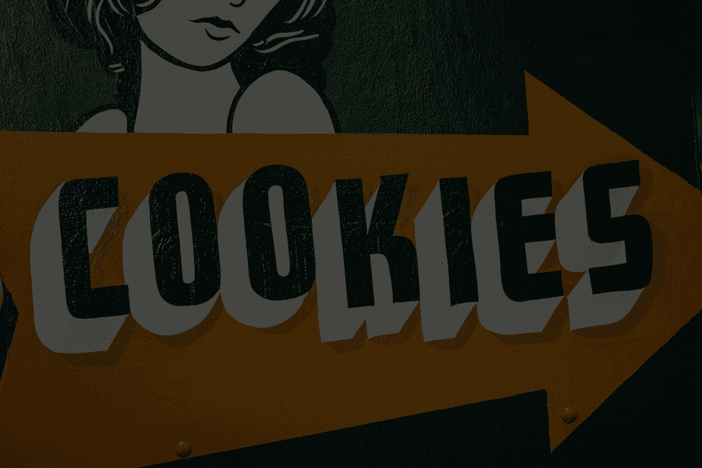 Skilt med teksten cookies – representasjon av informasjonskapsler og bruk av data på nettsiden