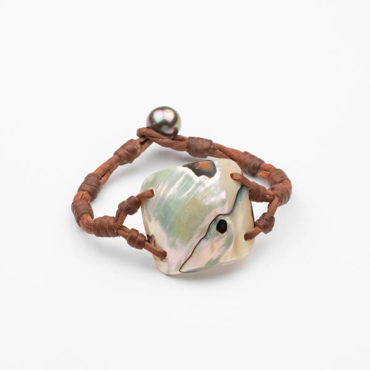 Iridescent seashell and dark Tahitian Pearl on hand-knotted brown leather bracelet — Manos de Oro Saint Barth