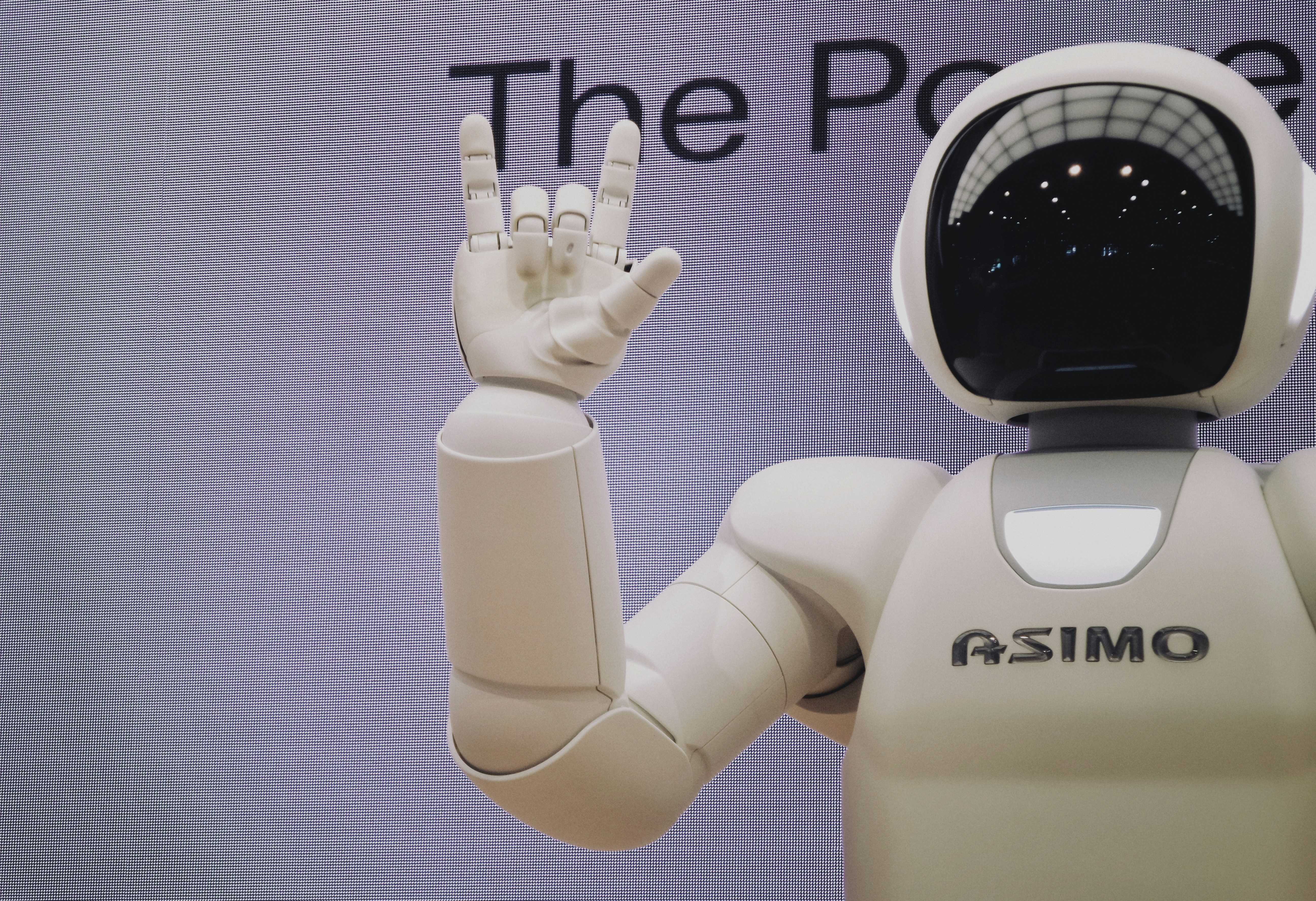 robot giving a hand gesture - Article Forge Alternatives