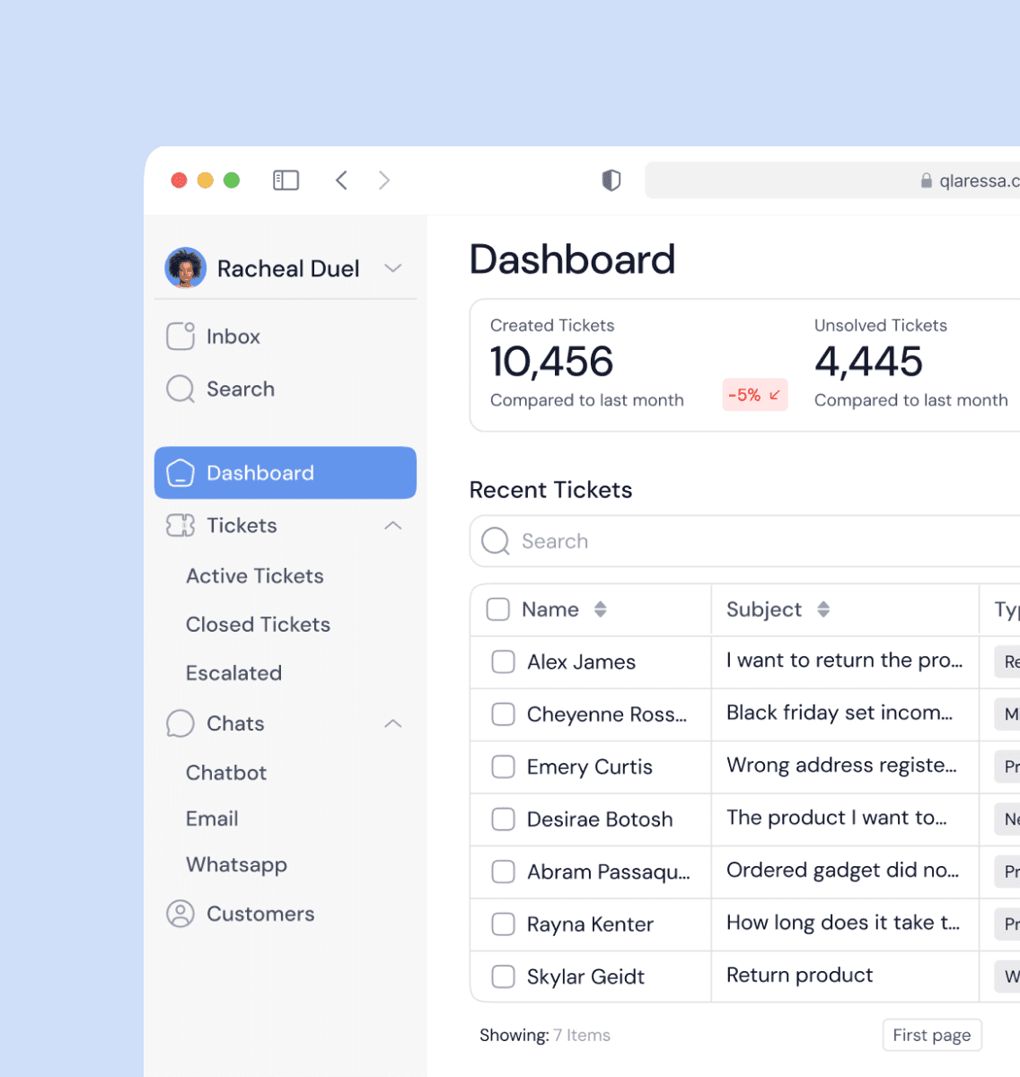 Modern home office setup with a monitor, ergonomic chair, keyboard, and indoor plants near a window with blinds.