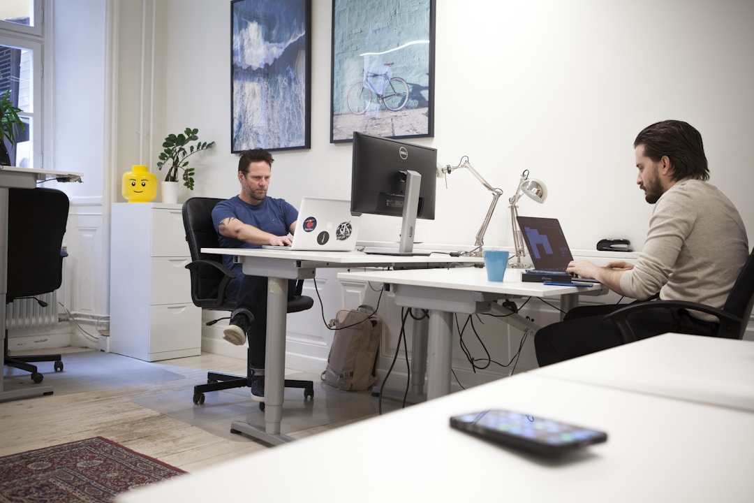 UX designers collaborating in a modern office environment