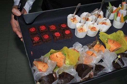 a plate with cakes and food