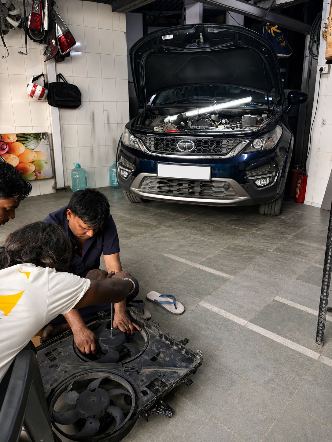 Hand gripping a steering wheel while driving.