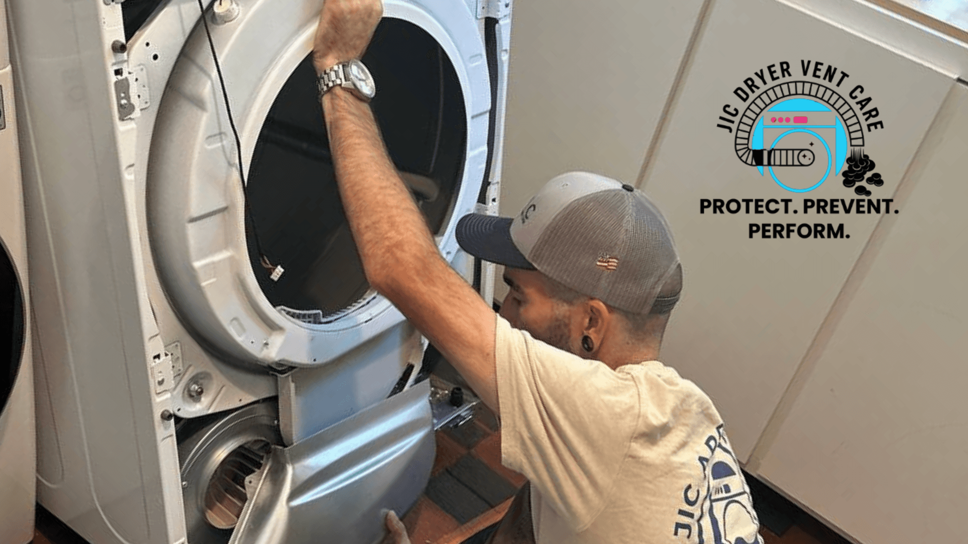 Technician inspecting overheating dryer during professional dryer vent cleaning service