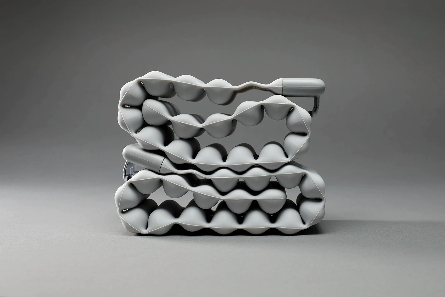 Mirror connected ankle weight folded into stacked flexible layers