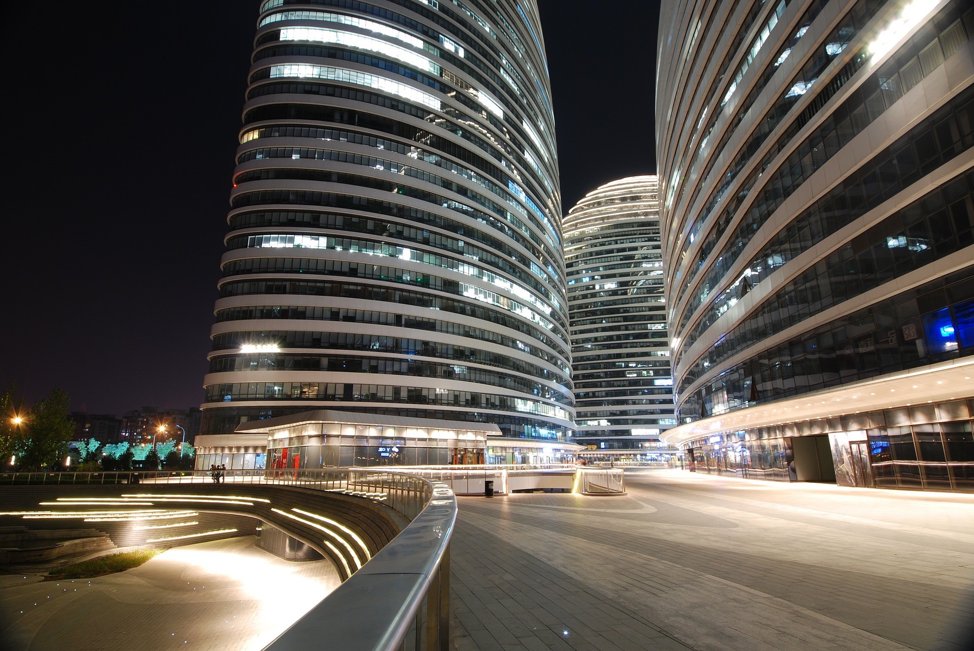 Contemporary commercial office towers at night, symbolising SMSF commercial property investment